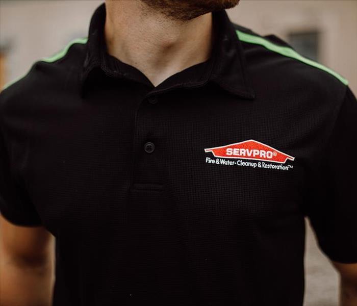 servpro hermitage/donelson services - man with black SERVPRO polo on