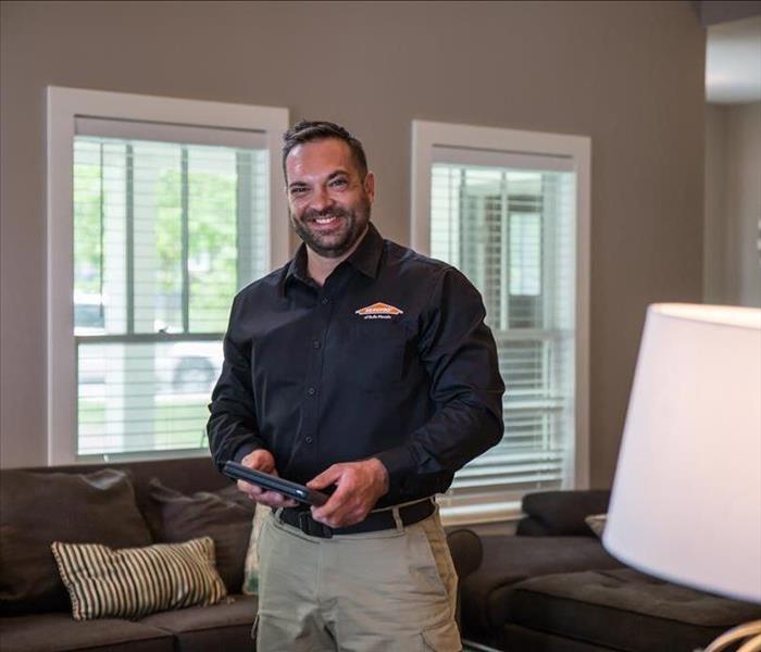 SERVPRO technician in residential property
